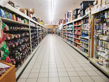 A grocery store aisle at Woody's grocery.